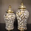 Elegant White and Gold Ceramic Lidded Jars